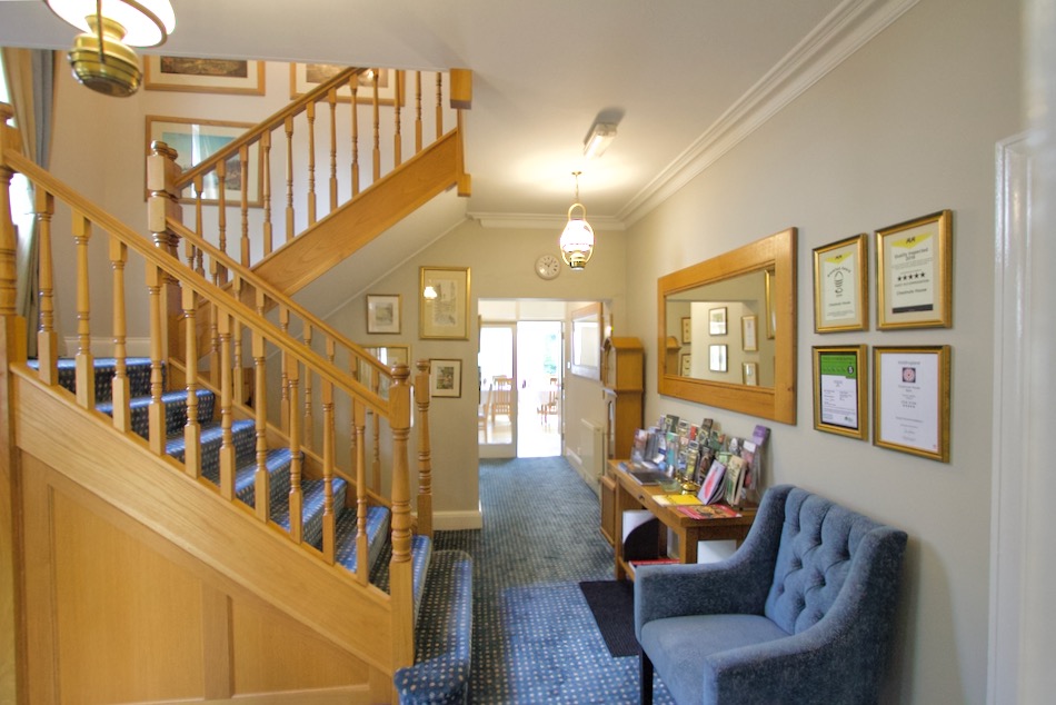 The staircase and hallway at Chestnuts House